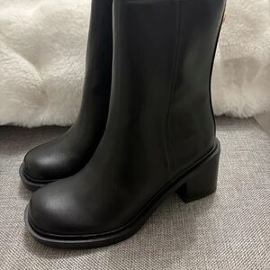 Elegant Black Heeled Boots for Women